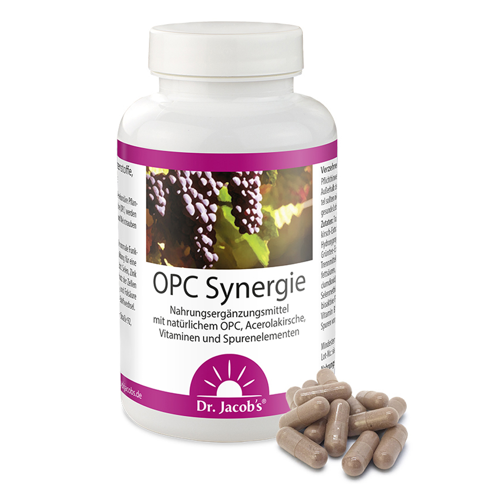Dr. Jacob’s OPC Synergie – Nahrungsergänzungsmittel in einer weißen Flasche mit violettem Etikett, die Kapseln enthält, neben mehreren Kapseln auf einer Oberfläche.